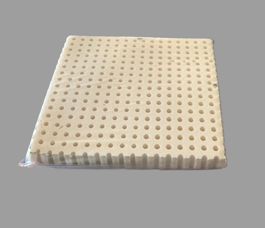 Coussin de latex recouvert d'une pellicule polyuréthane